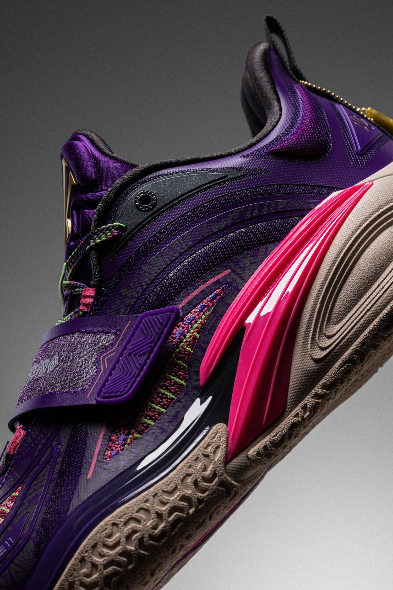 The side of Kyrie Irving's purple and red ANTA shoe.